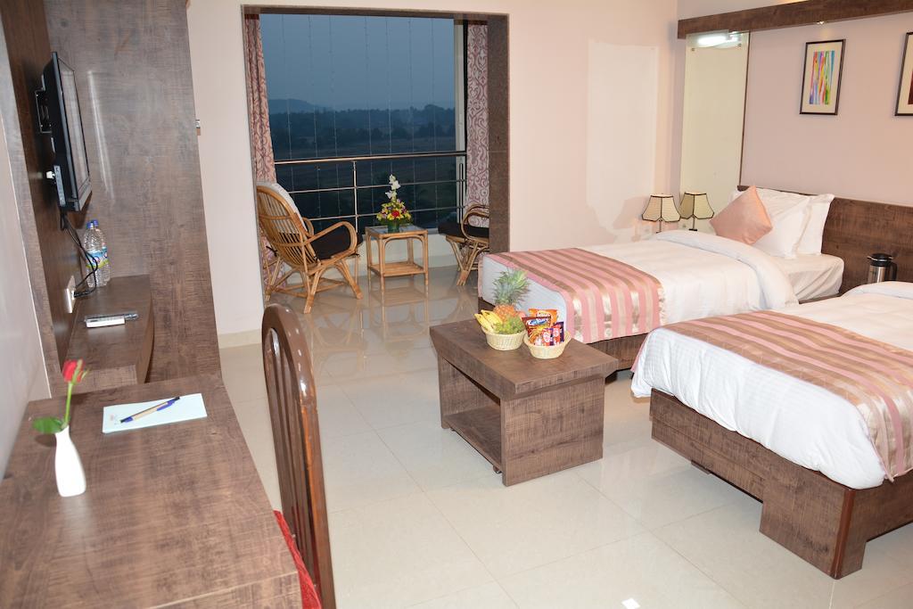Boshan Hotels Mapusa Szoba fotó