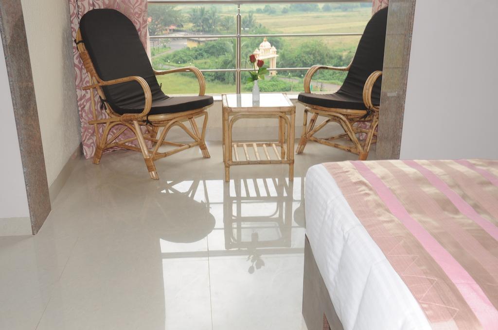 Boshan Hotels Mapusa Szoba fotó