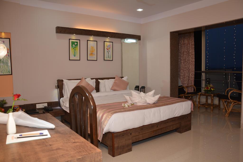 Boshan Hotels Mapusa Szoba fotó